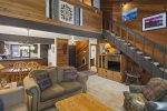 Mammoth Lakes Condo Rental Wildflower 18 - Living Room with Flat Screen TV, Stairs to the Loft
